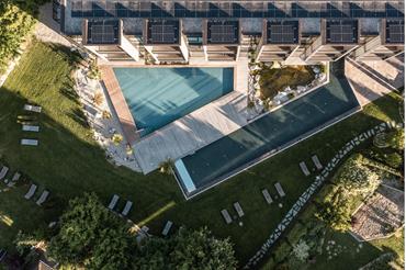 Pool and hotel seen from above