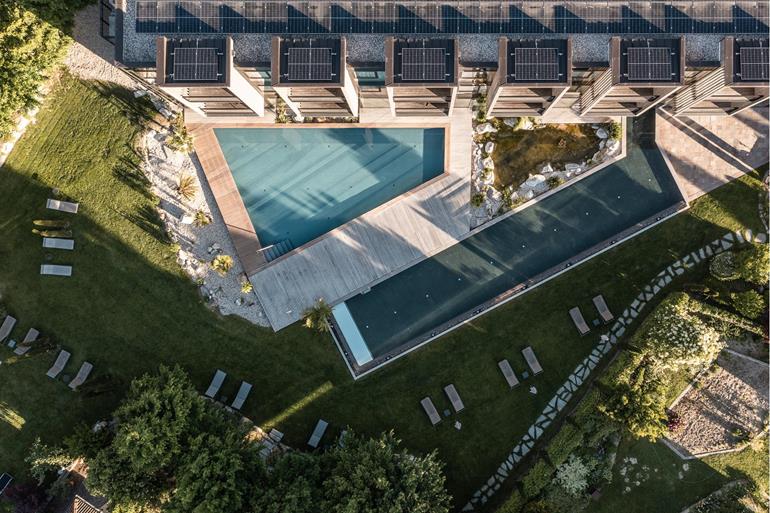 Pool and hotel seen from above