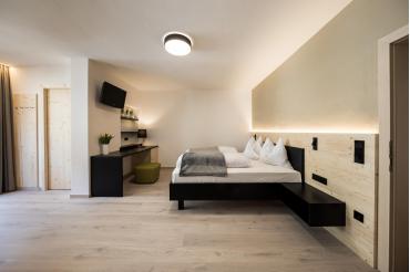 The bedroom of the Family room design